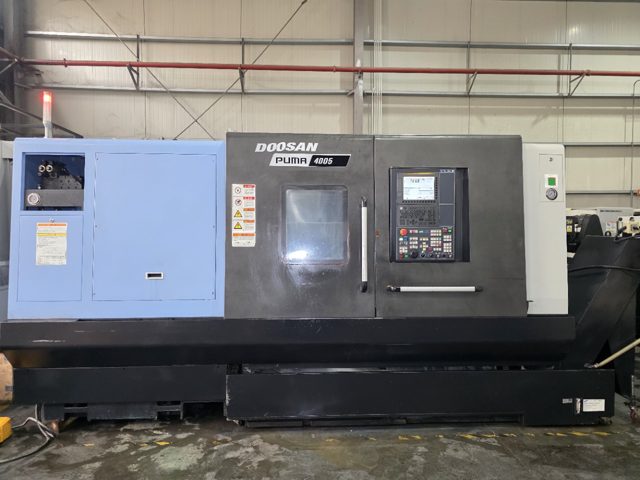 332，韩国斗山PUMA4005，A2-11主轴，过棒料117.5，配18寸三千里液压卡盘，主轴带齿轮箱 /重切神器，回转直径790，最大工件加工长度1042mm，两轴重型硬轨，12工位伺服液压刀塔,机床安装少用，新机品质精度。
